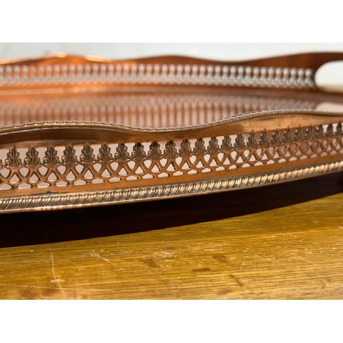 244 - A copper tray. 56.5x38x5.5cm