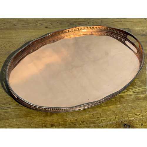244 - A copper tray. 56.5x38x5.5cm