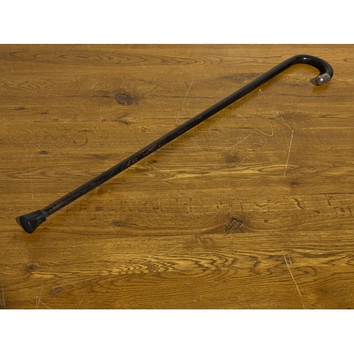 246 - A silver mounted walking stick. 87cm.