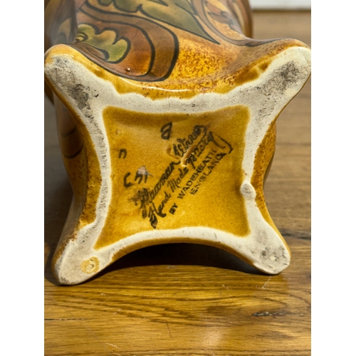 260 - A Flaxman Ware vase by Wadeheath. 11x15cm.