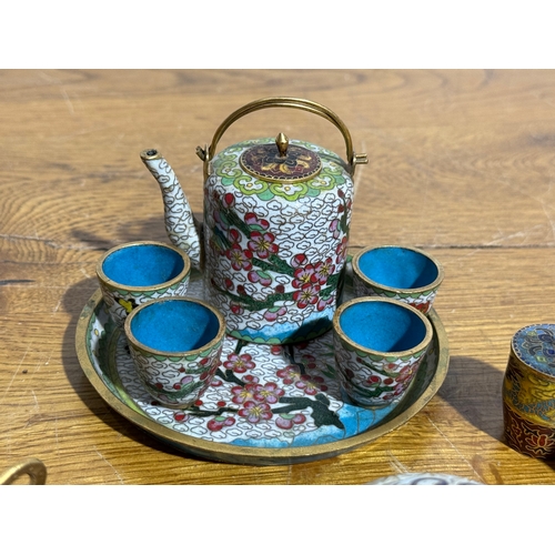 28 - Three vintage Chinese miniature cloisonné tea sets.