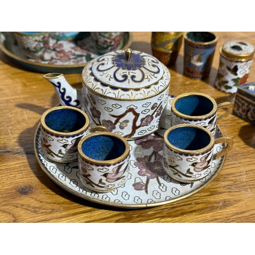 28 - Three vintage Chinese miniature cloisonné tea sets.
