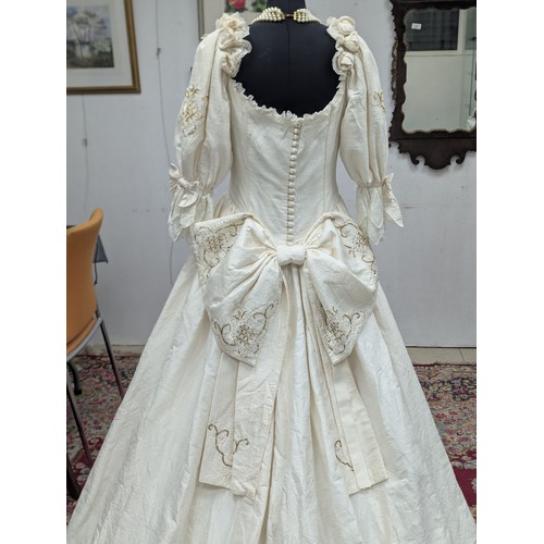 37A - A vintage wedding dress. Stand not included.