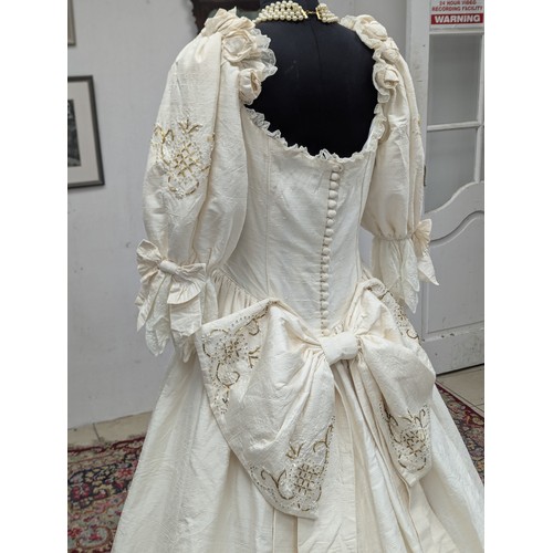 37A - A vintage wedding dress. Stand not included.