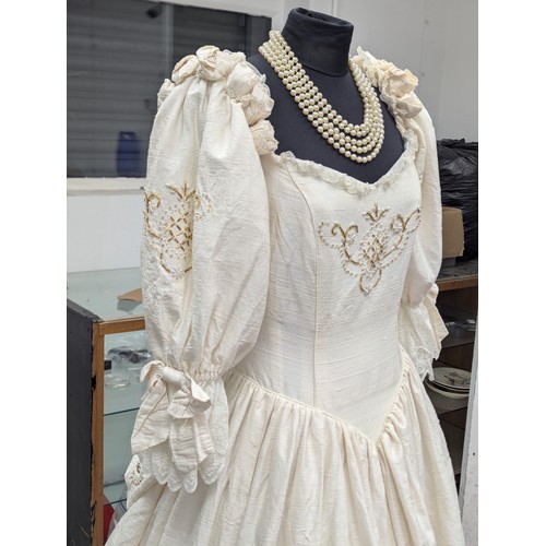 37A - A vintage wedding dress. Stand not included.