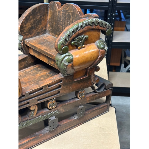 27A - A vintage child’s ornamental sleigh. German/Austrian. 74x29x42cm.