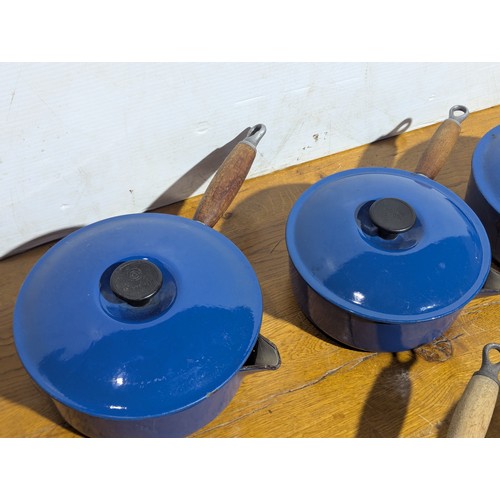 9A - A collection of Le Creuset pots and pans