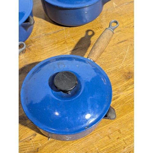 9A - A collection of Le Creuset pots and pans