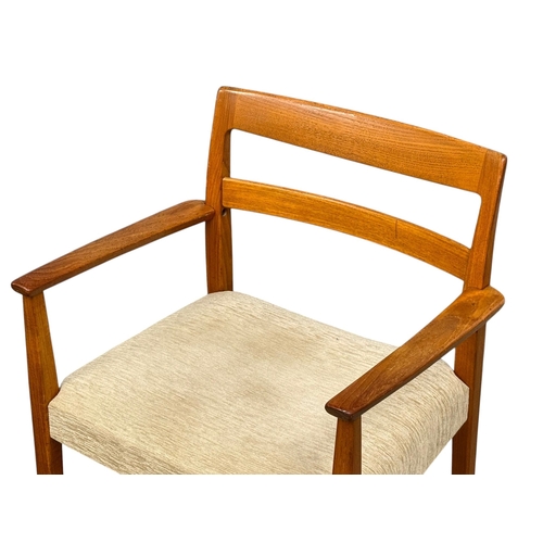 5 - Nils Jonsson, C.1960. A Danish Teak Two Leaf Extending “Ove” Dining Table and Eight Chairs. Designed... 