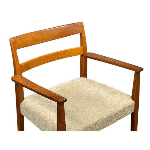 5 - Nils Jonsson, C.1960. A Danish Teak Two Leaf Extending “Ove” Dining Table and Eight Chairs. Designed... 