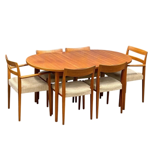 5 - Nils Jonsson, C.1960. A Danish Teak Two Leaf Extending “Ove” Dining Table and Eight Chairs. Designed... 
