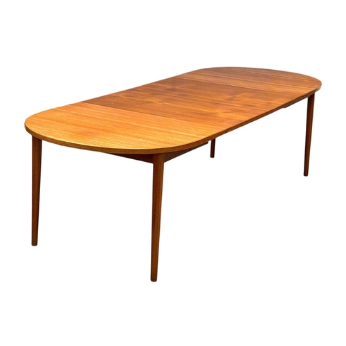 5 - Nils Jonsson, C.1960. A Danish Teak Two Leaf Extending “Ove” Dining Table and Eight Chairs. Designed... 