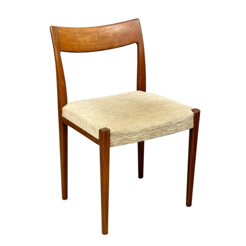 5 - Nils Jonsson, C.1960. A Danish Teak Two Leaf Extending “Ove” Dining Table and Eight Chairs. Designed... 