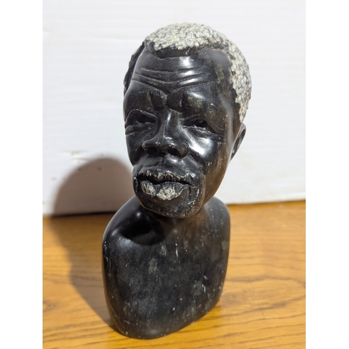 264 - 2 African stone busts, 15cm