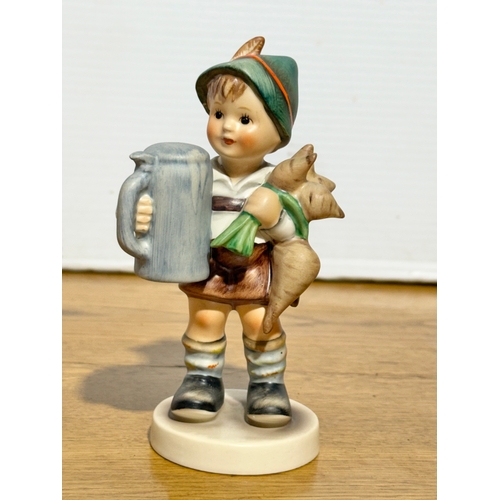 112 - A Goebel Hummel For Father figurine. 14cm.