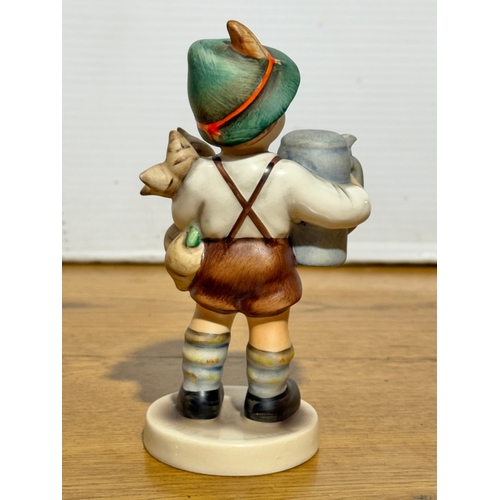 112 - A Goebel Hummel For Father figurine. 14cm.