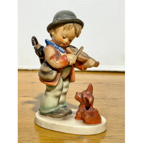 113 - A Goebel Hummel Puppy Love figurine. 13cm.