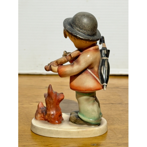113 - A Goebel Hummel Puppy Love figurine. 13cm.