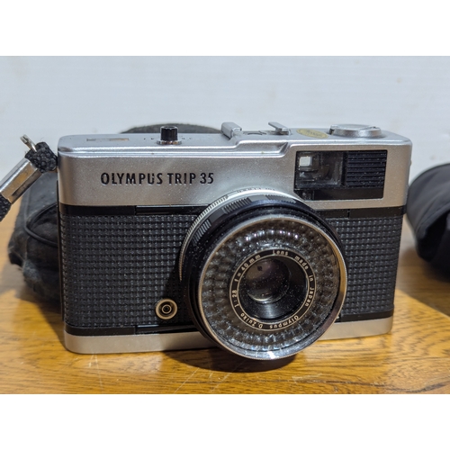 141 - Olympus trip 35 camera and a Kodak Advantix F300 camera