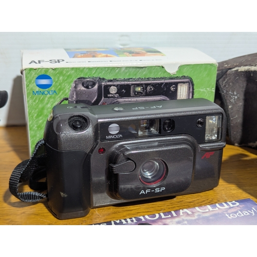 144 - Quantity of cameras and lenses including Canon, Kodak, Minolta, Olympus, Vivitar and Ilford
