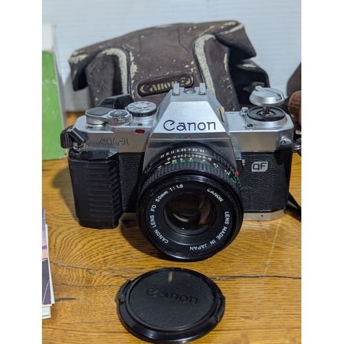 144 - Quantity of cameras and lenses including Canon, Kodak, Minolta, Olympus, Vivitar and Ilford