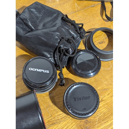 144 - Quantity of cameras and lenses including Canon, Kodak, Minolta, Olympus, Vivitar and Ilford