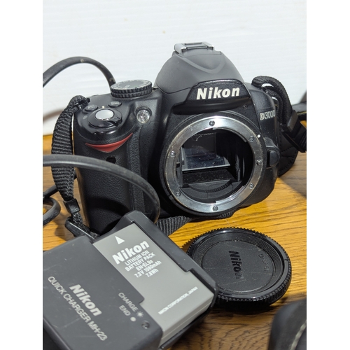 145 - Quantity of cameras and lenses including Nikon, Canon, Vivitar, Cobra etc