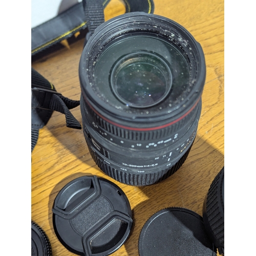 145 - Quantity of cameras and lenses including Nikon, Canon, Vivitar, Cobra etc