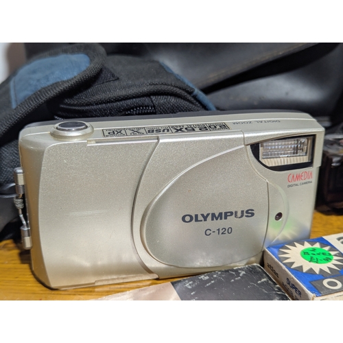 146 - Quantity of cameras and lenses including Zenith, Samsung, Olympus, Minolta etc