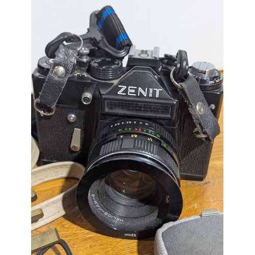 146 - Quantity of cameras and lenses including Zenith, Samsung, Olympus, Minolta etc