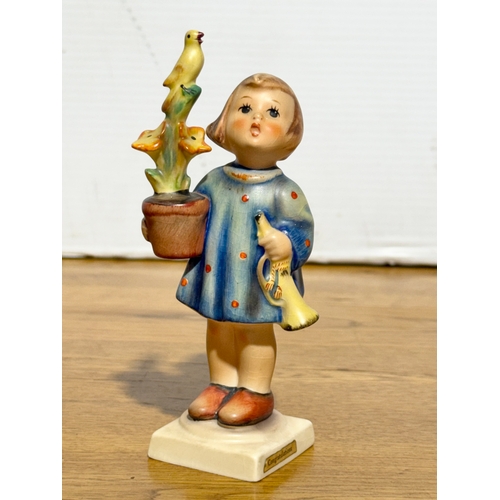 114 - A Goebel Hummel Congratulations figurine. 15cm.
