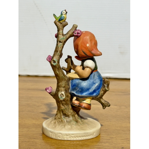 120 - A Goebel Hummel Apple Tree Girl figurine. 15.5cm.