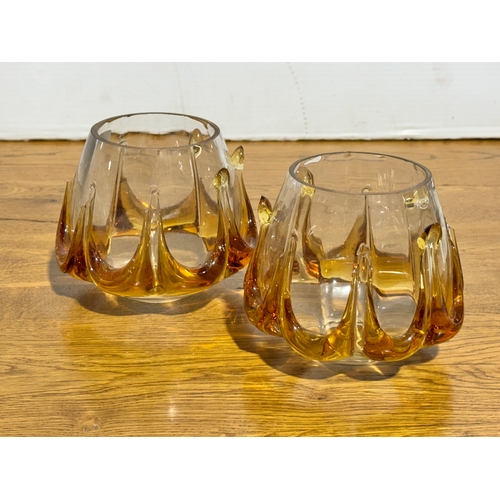 268 - A pair of vintage clear and amber glass lamp shades. 14x12cm.