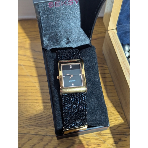 149 - Quantity of costume jewellery and watches