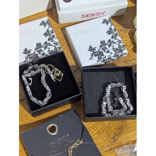 149 - Quantity of costume jewellery and watches