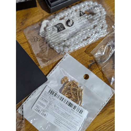 149 - Quantity of costume jewellery and watches