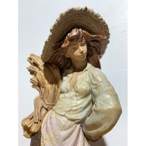 70 - A large Lladro Spring Shepherdess sculpture. 28x46cm.