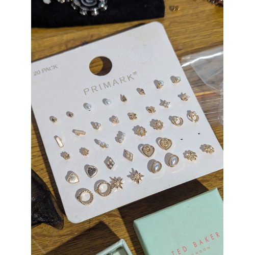 151 - Quantity of costume jewellery and watches