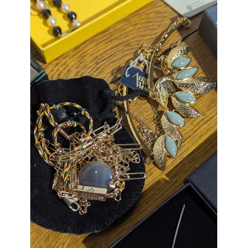 151 - Quantity of costume jewellery and watches