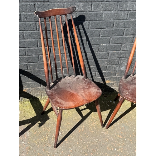 273 - A pair of Ercol Goldsmith dining chairs.