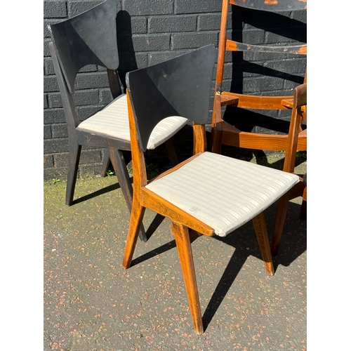 276 - A quantity of mid century dining chairs for restoration.