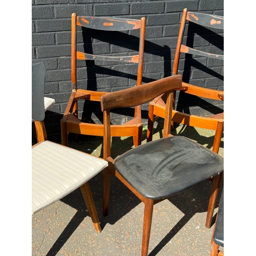 276 - A quantity of mid century dining chairs for restoration.