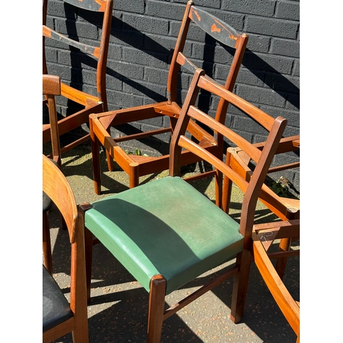 276 - A quantity of mid century dining chairs for restoration.