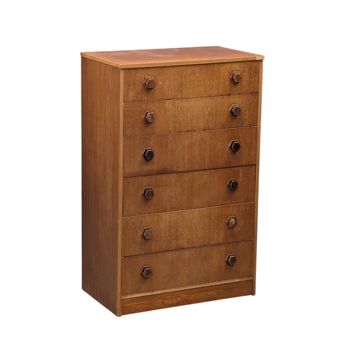 286 - A teak chest of drawers, C.1960. 69cm x 41.5cm x 109cm 7