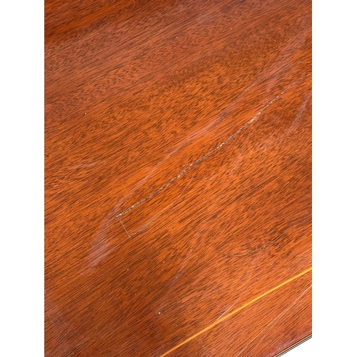 74 - A Georgian style inlaid mahogany concave side table. 99x43x74cm.