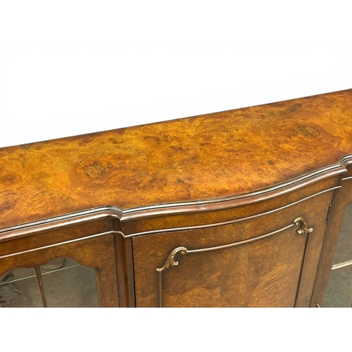 100 - A Georgian Style Figured Walnut Display Cabinet. Mid 20th Century. 130x36x122cm. (9)