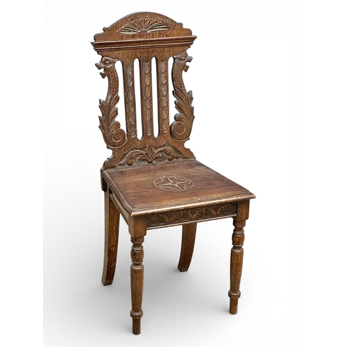 96 - A Victorian oak hall chair. C.1890. Late 19th Century.