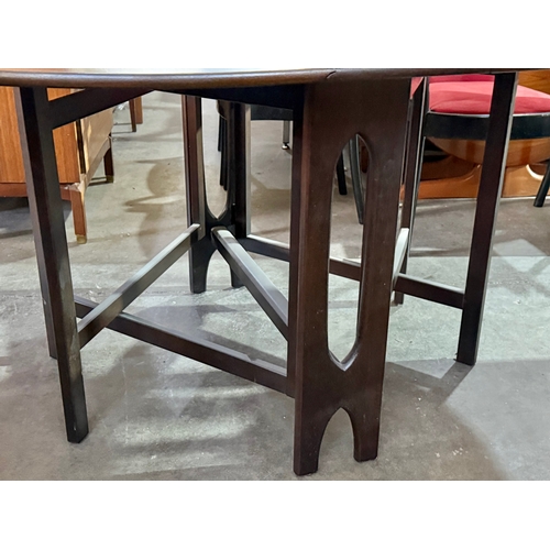 290 - A Jentique drop leaf dining table. 1960-70.