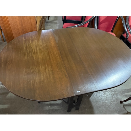 290 - A Jentique drop leaf dining table. 1960-70.