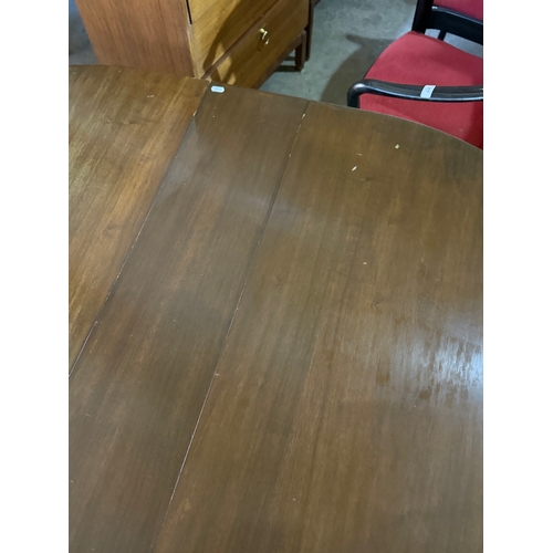 290 - A Jentique drop leaf dining table. 1960-70.